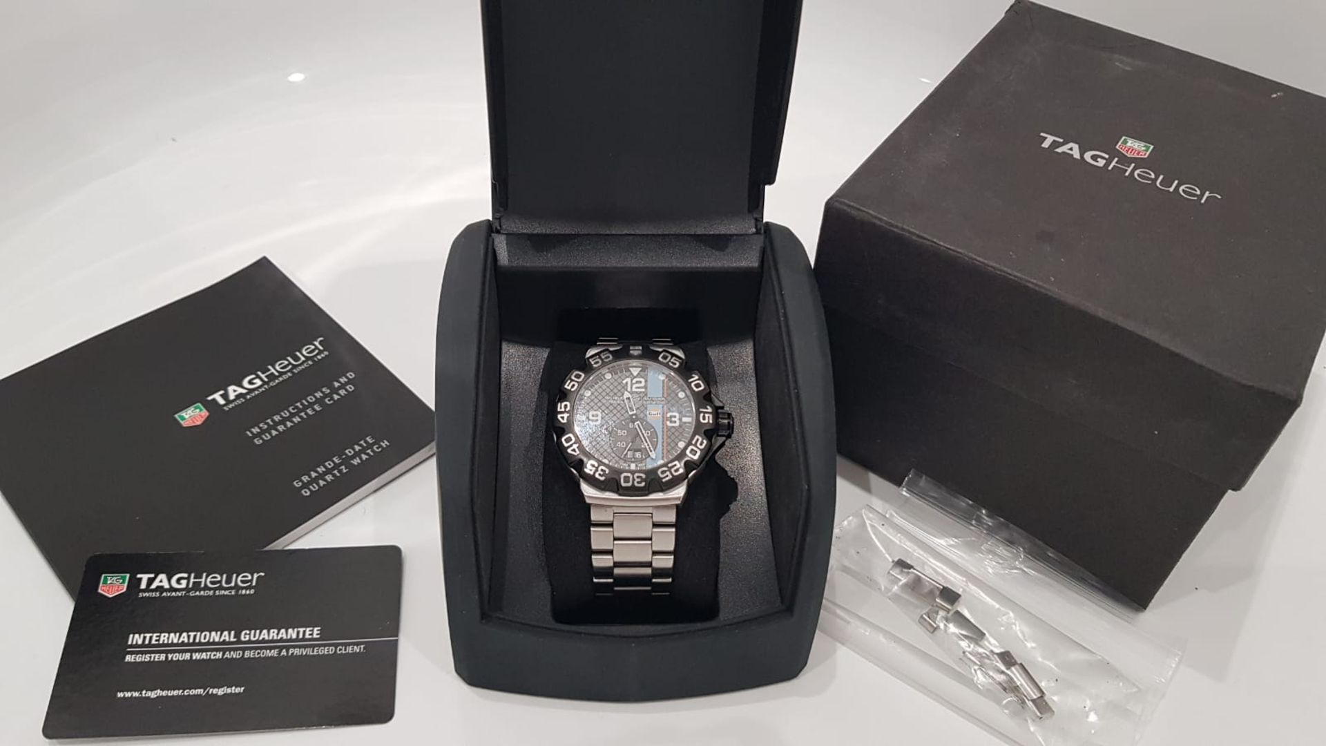 TAG HEUER GULF F1 LIMITED EDITION MENS WATCH 44mm WITH BOX AND PAPERS /GUARANTEE CARD. WAH1013