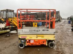 2010 JLG 1930ES ELECTRIC SCISSOR LIFT, SHOWING A LOW 299 HOURS, 4 BATTERIES, TOP CONTROL INCLUDED