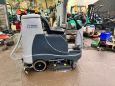 NILFISK BR755 RIDE ON SWEEPER/SCRUBBER, DRIVES AND WORKS, SHOWING A LOW 584 HOURS *PLUS VAT*