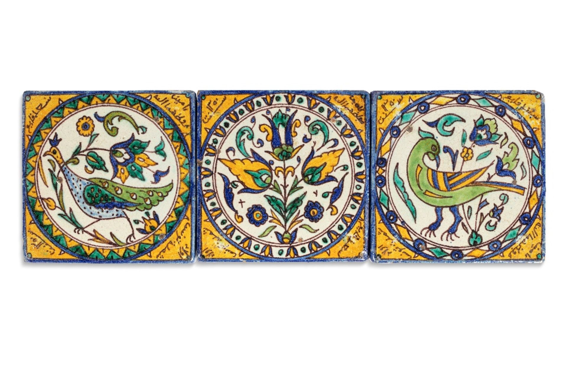Trois carreaux ChemlaTunisie, daté 1355H (=1936)En céramique à décor en polychromie à médaillon