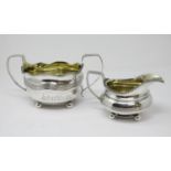 A George III silver large two-handled Sugar Bowl and Milk Jug with egg and dart rims, engraved