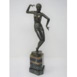 A bronze figure of "The Red Dancer", signed by F Preiss, standing on a coloured marble hexagonal