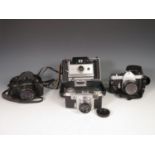 A Contax 35mm Camera with 2/50 Zeiss-Opton Lens, two Pentax 35mm Cameras and a Polaroid 355