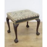 A 19th Century mahogany Dressing Stool, the tapestry stuff over seat above carved cabriole legs on