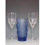 A modern Lalique tapering blue glass Vase, moulded swallows, engraved signature under, 6 1/2in H,