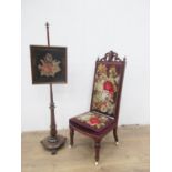 A Victorian high backed Chair with pierced and carved cresting rail, tapestry back and seat on