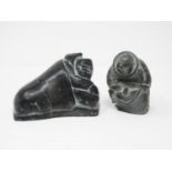 An Inuit carved stone Sculpture of a sleeping man, signed Davidee Tool to underside and bearing