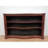 A 19th Century marble topped rosewood serpentine fronted open Bookcase with adjustable shelves on