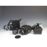 A Zenza Bronica Camera including Zenza Bronica 2.4/80mm lens, spare film back, Nikkor-P 4/200mm zoom