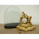 A French gilt metal Mantel Clock the circular dial flanked by dog and game with pierced scrolled