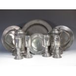 A pair of large antique lidded pewter Tankards 11 1/2in H, a Charger, three Plates and four Goblets