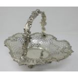 A Tiffany & Co sterling silver pierced oval Cake Basket with scroll and floral design, No 15623/