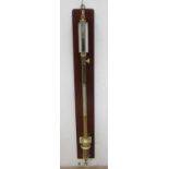 A brass maritime Barometer and Thermometer by F. Darton & Co, London 1940 on mahogany mount 3ft