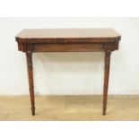 A 19th Century mahogany fold-over Card Table with shaped rectangular top, moulding to the frieze and