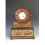 A 19th Century mahogany and brass inlaid Mantel Clock with circus rider and horses decoration