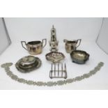 A quantity of plated items including Sugar Caster, Toastrack, Chain Belt, Jug, Butter Dish