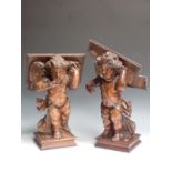 Two Italian 18th Century walnut Reading/Music Stands with standing winged Cherub figures on oblong