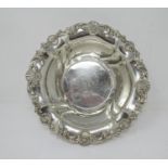 A sterling silver circular Bowl with scallop and scroll border, engraved initials, 10in diameter,