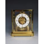 A Jaeger Le Coultre Atmos Clock in brass and glazed case, numbered 445406 9 1/2in H x 8in W