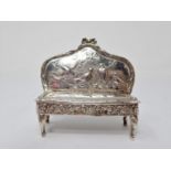 An Edward VII Continental silver miniature Settee decorated birds with ribbon surmount. Import mark,