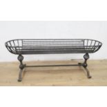 A wrought iron Garden Trough with cheval frame having spiral supports, 5ft 2in