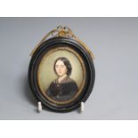 CONTINENTAL SCHOOL, c.1830. Portrait miniature of a Lady, quarter-length, wearing a black dress,