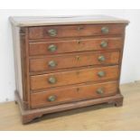 A 19th Century elm Chest of four long drawers with quarter round pilasters and raised on bracket