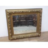 A 19th Century gilt framed Wall Mirror with relief fruit and wheat decoration 3ft 2in W x 2ft 8in H,