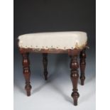 A Georgian mahogany framed Footstool on turned supports, 1ft 3in H x 1ft 2in W x 1ft D.