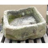 A large rectangular stone Trough of irregular form 2ft 5in W x 1ft 9in D x 1ft 5in H