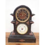 A black marble Mantel Clock/Barometer, the circular clock dial with exposed movement, above a