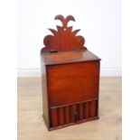 A 19th Century oak Candle Box with shaped back above hinged lid fitted with unusual shaped drawer to