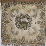 A 19th Century Needlework Wall Hanging with central stumpwork type panel with design of sheep in a
