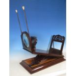 A Victorian walnut Stereoscopic Viewer with hinged base and fretwork carving, 1ft 10in L