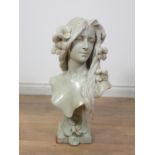 An Art Noveau Bust of a girl with flowers in her hair, signed George Coudray 1ft 11in H