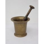 An antique brass Pestle and Mortar