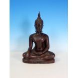 An Eastern bronze Figure of a seated Buddha, 11 1/2in H