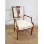A 19th Century satinwood and floral painted Salon Elbow Chair with cream upholstered seat mounted
