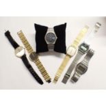 A mid-size Seiko Quartz Wristwatch, the black dial with hourly baton markers, sweep seconds hand and
