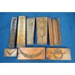 A collection of ten 19th Century carved wooden Plaster Moulds including; flaming torch, floral swag,