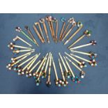 A collection of approx thirty five carved bone and carved wooden Lace Bobbins, mostly beaded