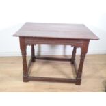 A mid-17th Century oak Alter Table with three plank top above chip and zig zag carved frieze mounted