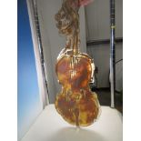 A sculpted glass model of a Violin with sand coated finish 23in, signed to the back, possibly by