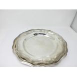 A German silver shaped circular Dish with reeded rim, 12 1/2in, and a similar Alpacca plated Dish,