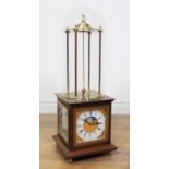 A Devon Clock Company commemorative copy of Royal Observatory Conical Pendulum Clock, under glass