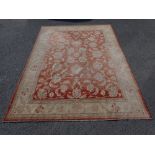 A large Ziegler style cream and red woollen Carpet 374cm x 271cm