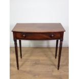 A 19th Century mahogany bow fronted Side Table fitted single frieze drawer mounted upon turned