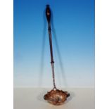 A Georgian silver Toddy Ladle, with embossed bowl and finely turned wooden handle, 14in L