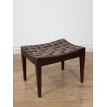 A 20th Century mahogany Stool with leather and brass studded strapwork top by Simpsons of Kendal 1ft