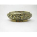 A Chinese bronze Bowl with reserves of figures on horseback, etc, roundel of reign marks, etc, to